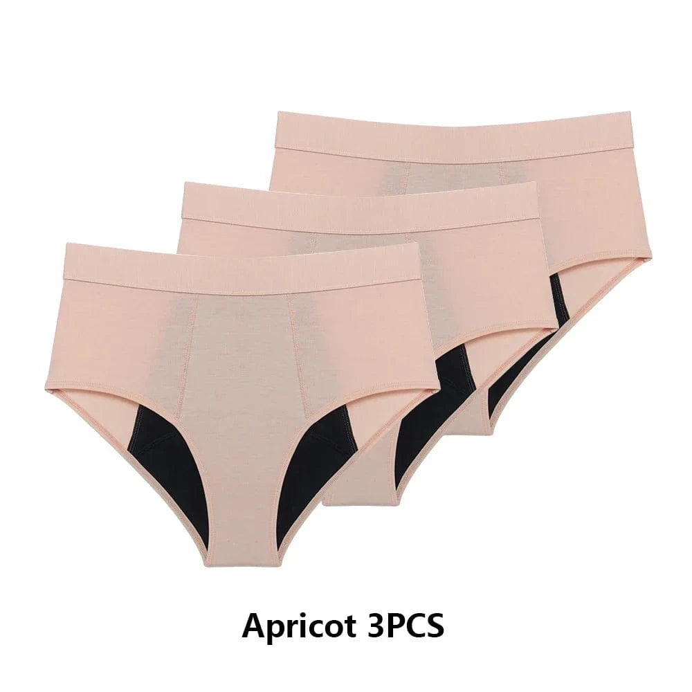 Three apricot-colored high-waisted period panties with black gussets arranged in a stack against a plain white background.