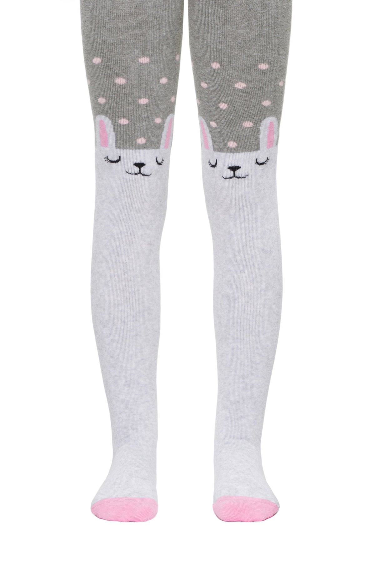 Grey and white children's tights feature a polka dot pattern on the thighs and a cute sleepy bunny face design on each knee with pink accents on the ears and toes.