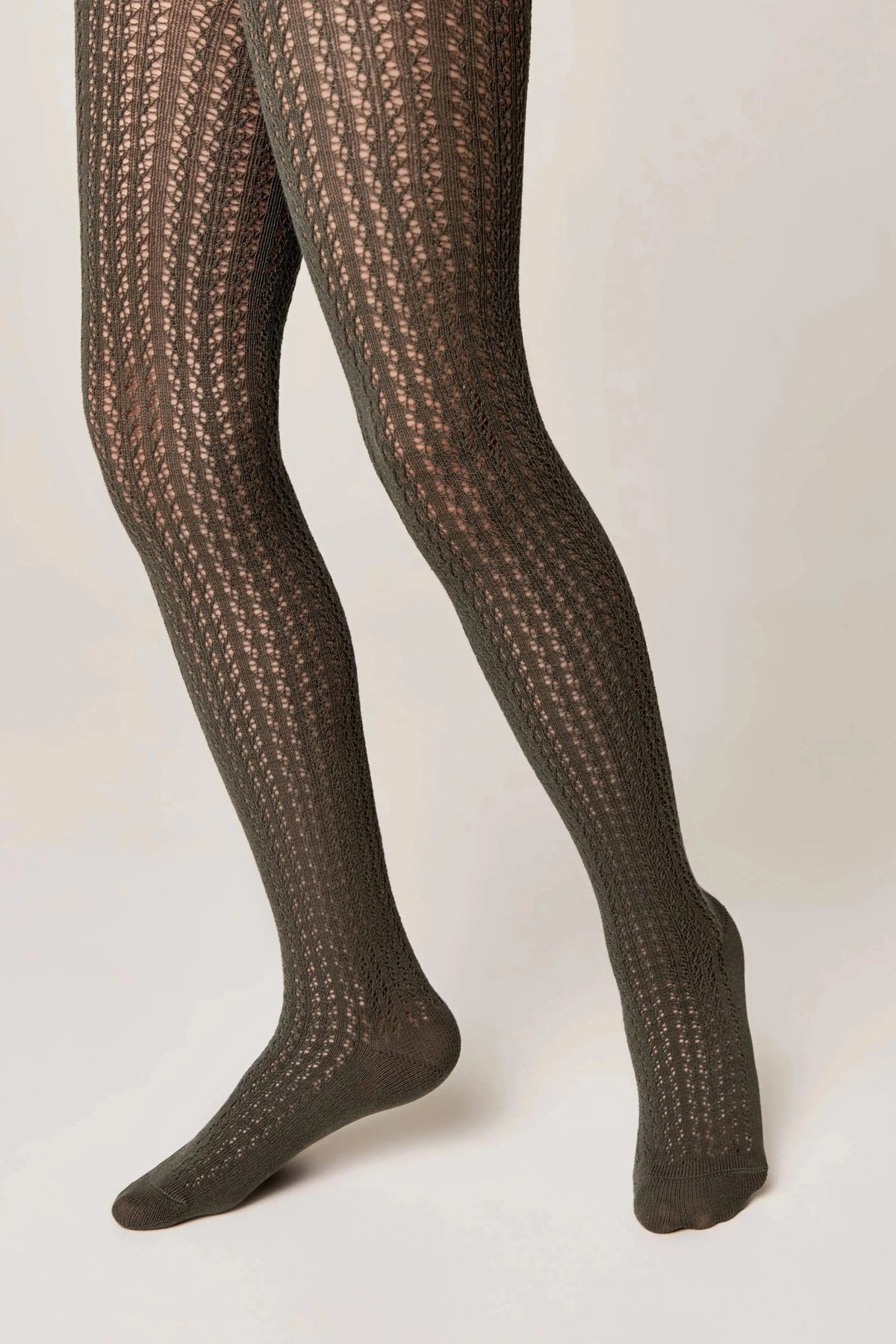 Olive green knit tights featuring a vertical textured lattice pattern on a neutral background.