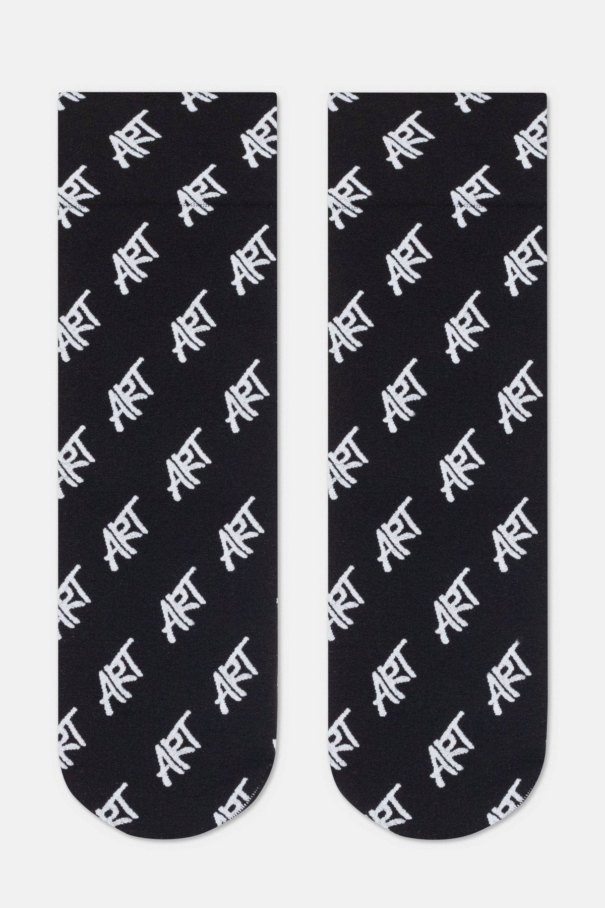 A pair of black crew socks featuring a repeating white diagonal pattern of the word ART in a handwritten style font.