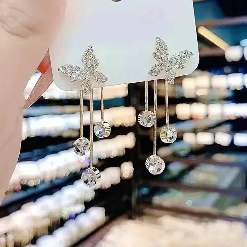 Golden-Tone Alloy Zirconia Dangle Earrings - A-1 Thread Vault