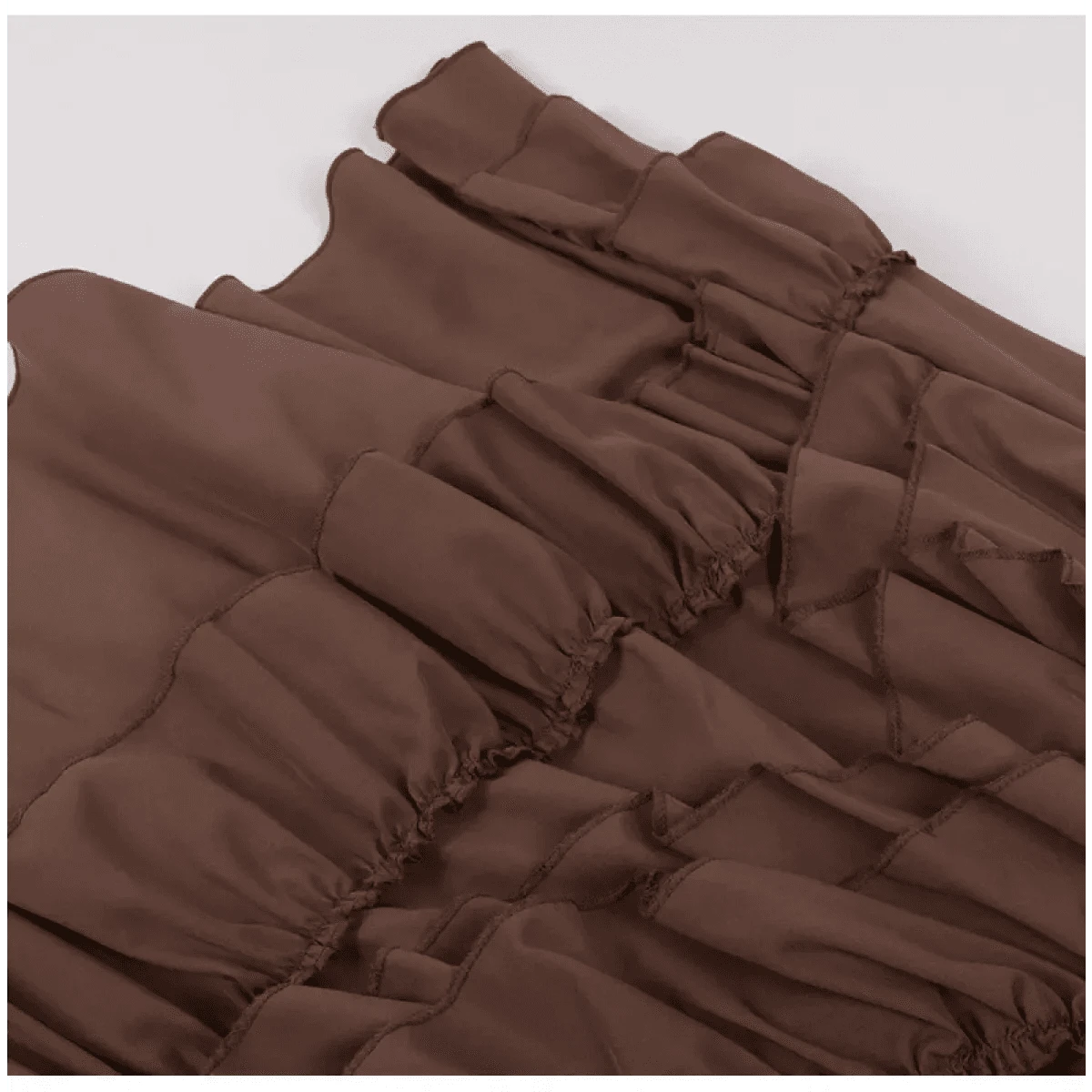 A brown skirt featuring multiple horizontal ruffled tiers with visible stitched seams.