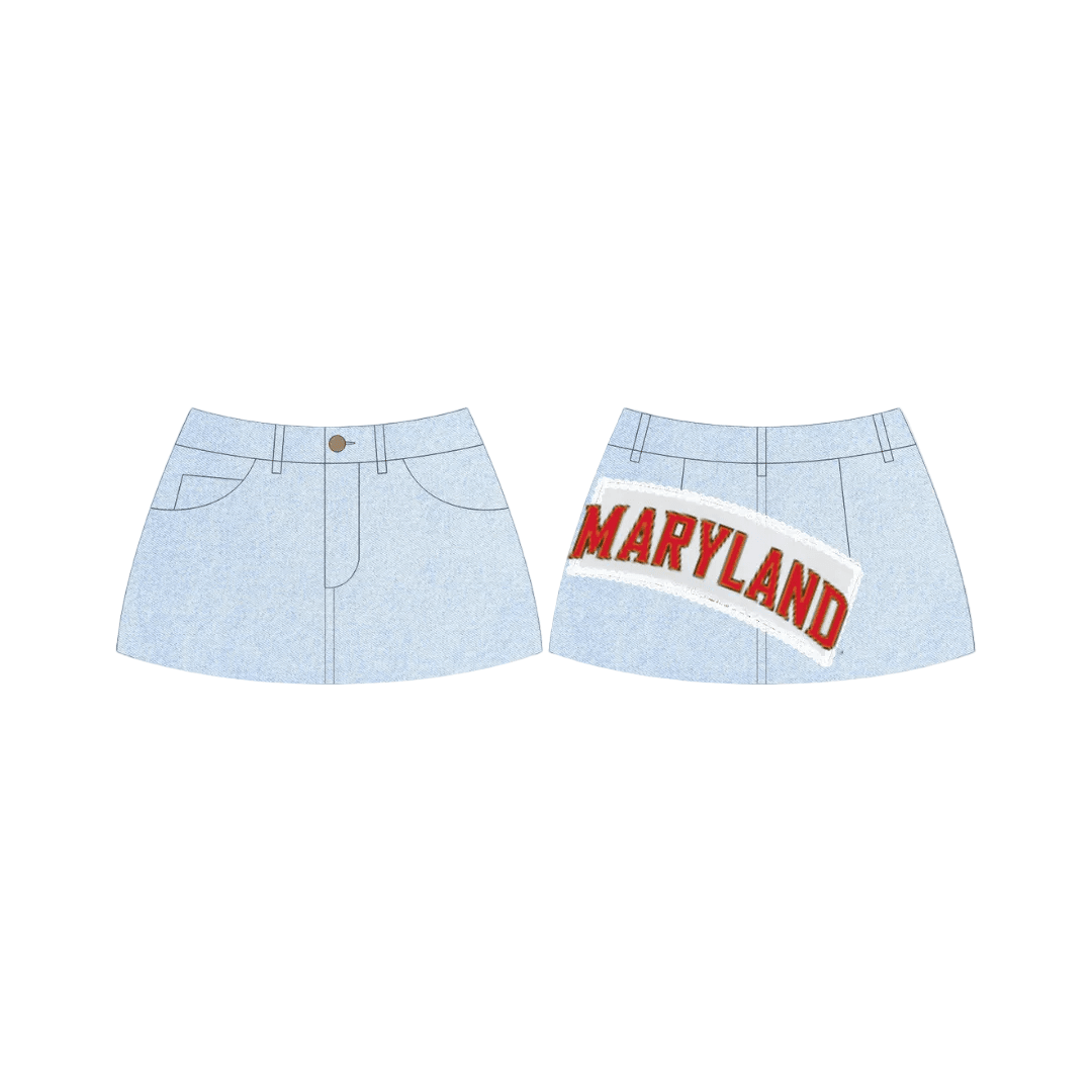 A light-wash denim mini skirt shown from the front and back, with the back featuring a large, curved embroidered patch that reads MARYLAND in red block letters.
