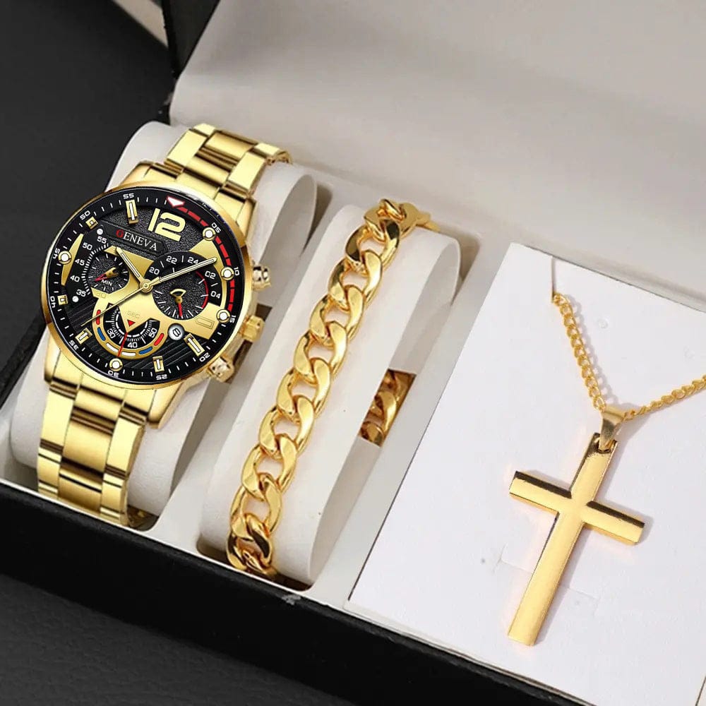 A gold-toned men's watch with a black multi-dial face, a matching gold-tone chain bracelet, and a gold-tone cross pendant on a delicate chain are displayed inside an open gift box.