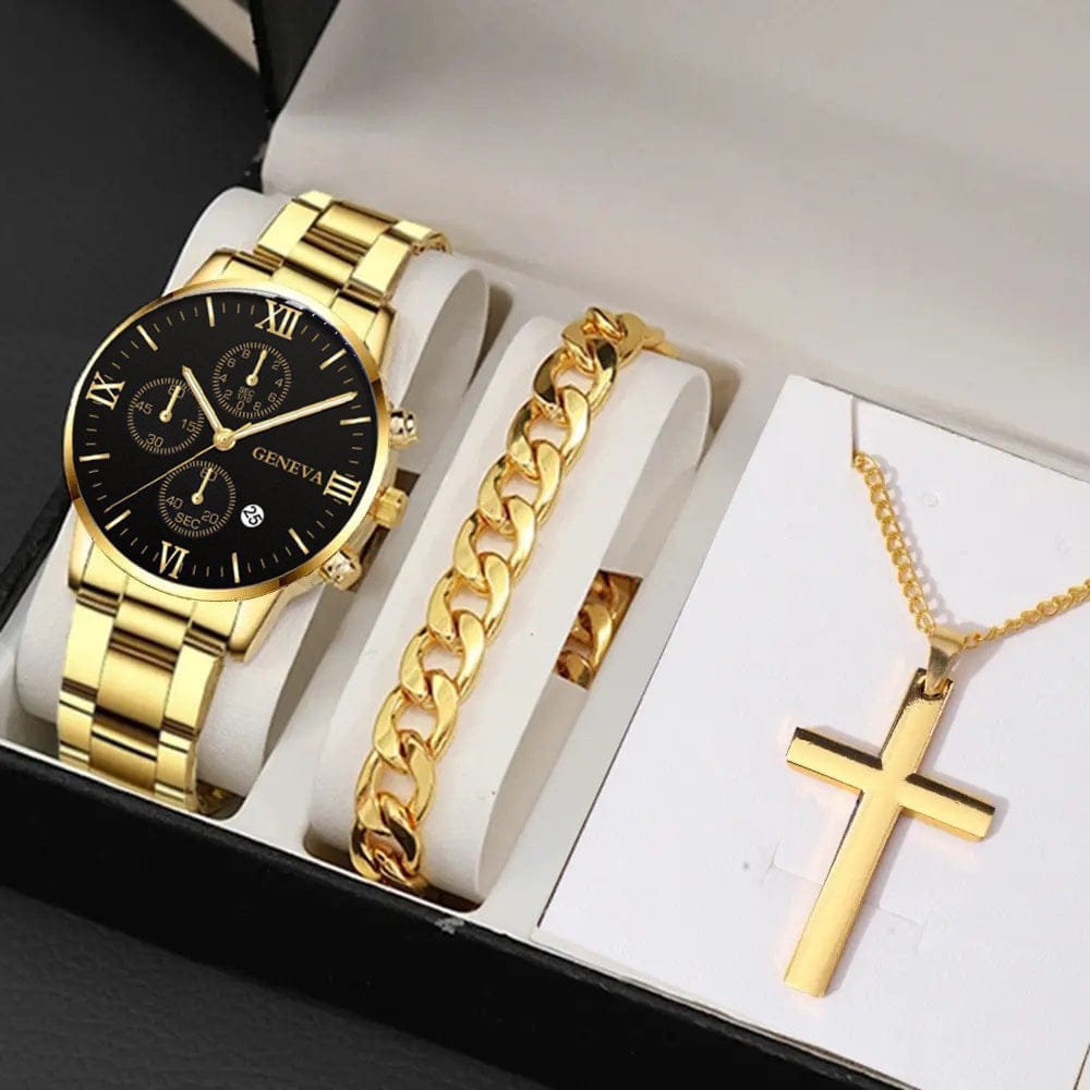 A gold-toned wristwatch with a black face and Roman numeral indices is displayed in a gift box alongside a matching gold-toned curb chain bracelet and a cross pendant on a gold-toned necklace.