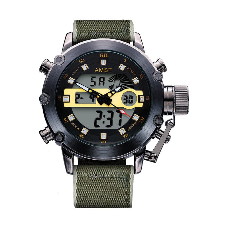 A rugged analog-digital watch with a black circular face, green fabric strap, yellow accents, and exposed metal side buttons against a white background.