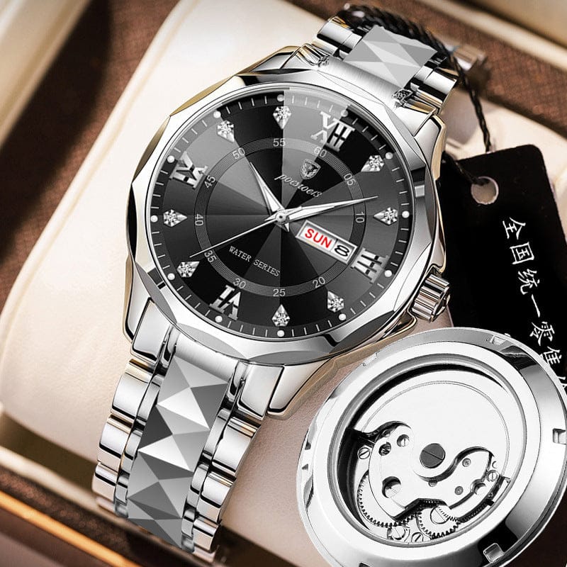 A silver-toned stainless steel wristwatch with a black round dial featuring diamond-shaped indices, Roman numerals, a day-date window, and a unique faceted link bracelet, shown alongside its exposed automatic mechanical movement.