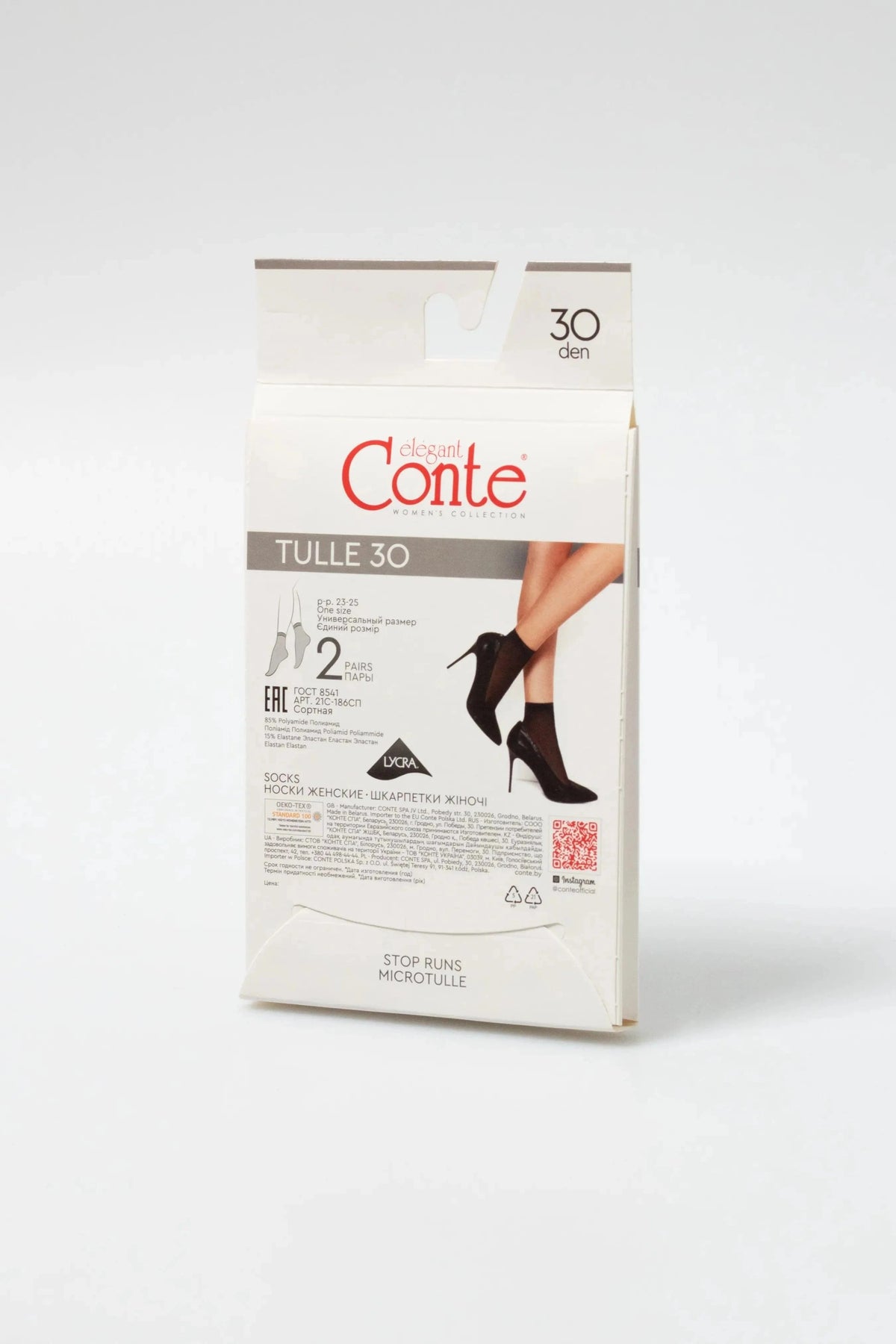 A box of black, sheer, ankle-high stockings for women shown in a product shot with a cut-out preview of the hosiery worn with high-heeled shoes.