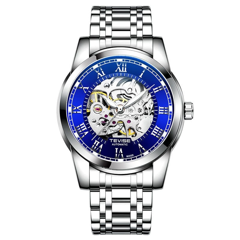 A silver-toned stainless steel automatic watch with a round blue dial featuring a skeletonized center and Roman numeral hour markers on a metal link bracelet.
