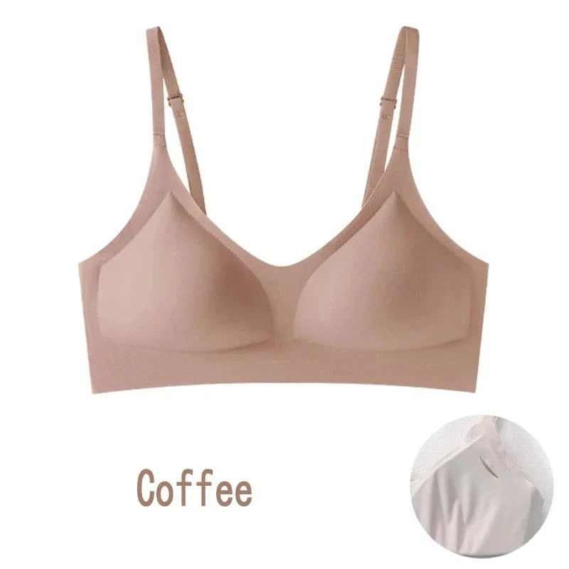 A coffee-colored wireless bra with a seamless design, thin adjustable shoulder straps, and molded cups, shown against a white background with a zoomed-in circular inset detail.