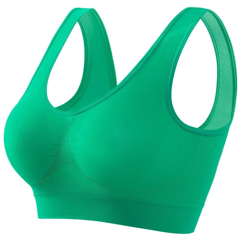 A bright green seamless sports bra with wide shoulder straps and a rounded neckline on a white background.