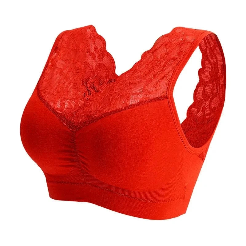 A red V-neck bralette features a solid-colored bust and a decorative lace neckline and strap design.