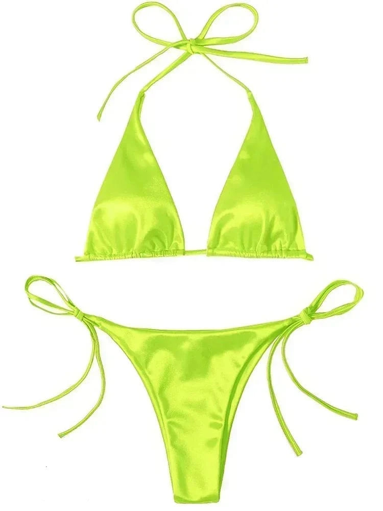 A bright lime green bikini set featuring a classic triangle top with tie closures and matching high-cut bottoms with side ties.