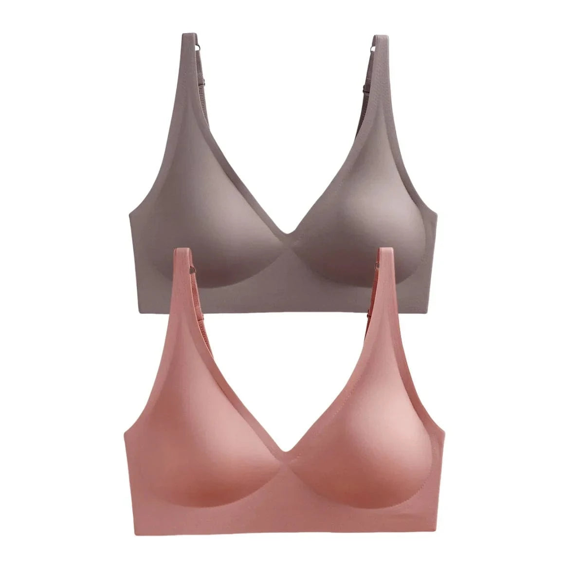 Two seamless wireless bras with V-neckline straps stacked vertically, with the top bra in a dusty taupe and the bottom bra in a soft rose pink.