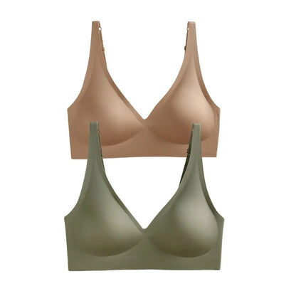 Two seamless, v-neck bralettes are stacked vertically, featuring a tan version on top and a muted olive green version on the bottom.