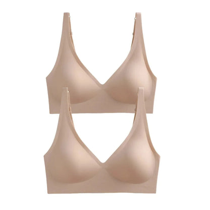 Two identical beige V-neck wireless bras with thin adjustable straps arranged vertically against a plain white background.