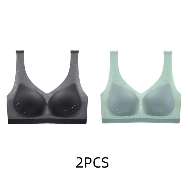 Two wireless sports bras with perforated cup details, shown in black and light green.