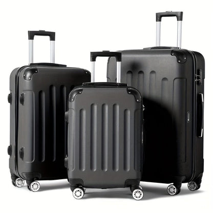 Three matte black rolling suitcases with vertical ribbed detailing and extended telescoping handles stand against a white background.