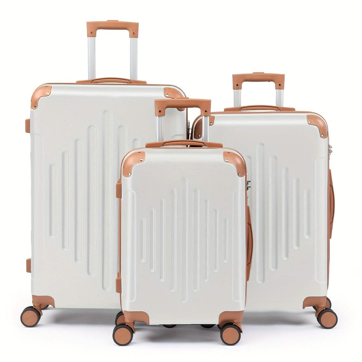 Three light silver suitcases of varying sizes stand in a row, each featuring brown corner protectors, handles, and wheels against a white background.