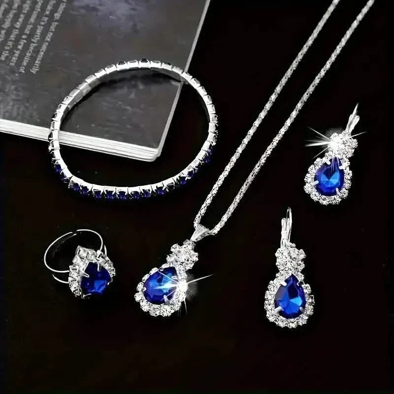5-Piece Set: Stylish Jewelry Set for Women, Pair of Earrings, Necklace, Ring and Bracelet Adorned with Glass Accents - A-1 Thread Vault