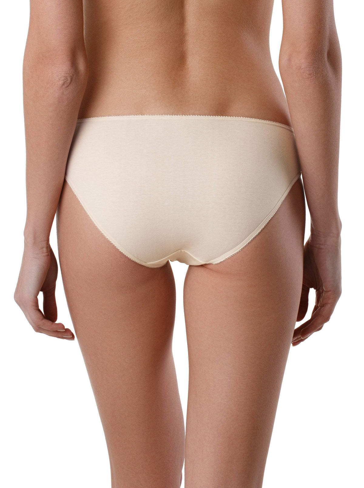A pair of beige bikini-cut panties shown from the back on a person, featuring a simple cotton-style fabric and thin elasticized trim.