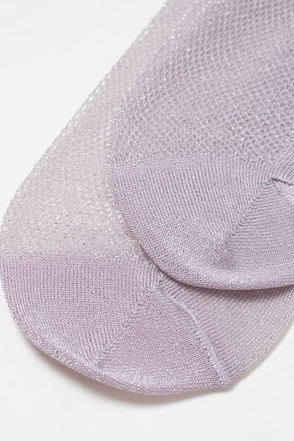 A pair of sheer, lavender-colored socks with a subtle shimmery finish and a fine, open-knit texture.
