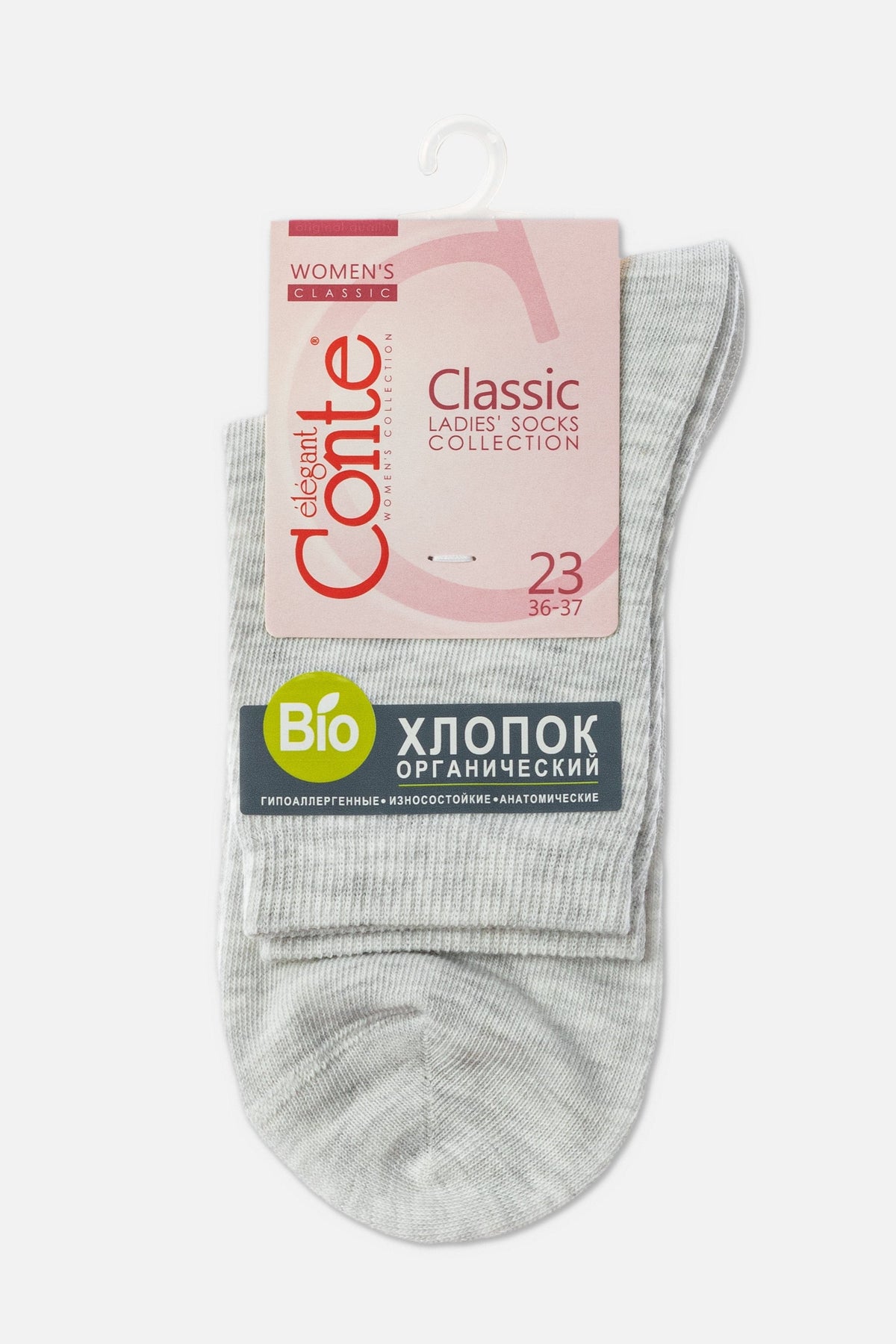 A pair of light grey women's socks folded on a branded paper hanger with organic cotton and size labeling.