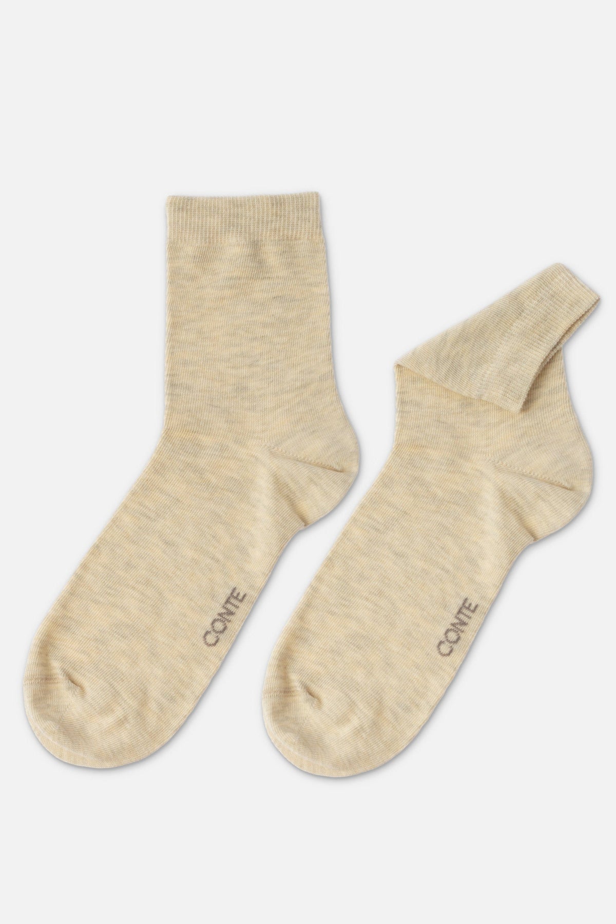 Two light beige knit ankle socks with the word CONTE printed in small grey letters near the toe area, displayed against a plain white background.