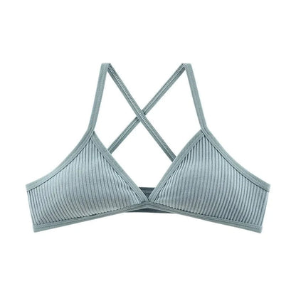 A sage green ribbed bralette featuring a triangular silhouette with crisscross spaghetti straps.