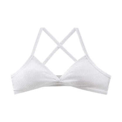 A white ribbed bralette featuring triangle cups and thin crisscross straps.