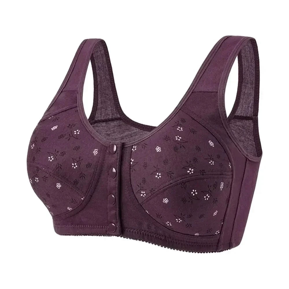 A deep purple front-closing bra featuring a small white floral print across the cups and wide, comfortable shoulder straps.
