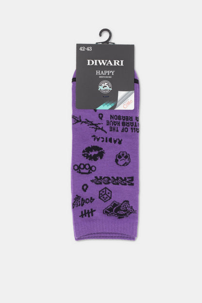 Purple men's socks feature an all-over black pattern of various gaming-themed icons, text, and abstract shapes, presented on a branded cardboard hanger.