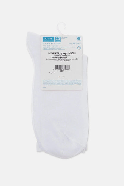 A pair of white crew-length socks on a cardboard hanger with product information labels attached.