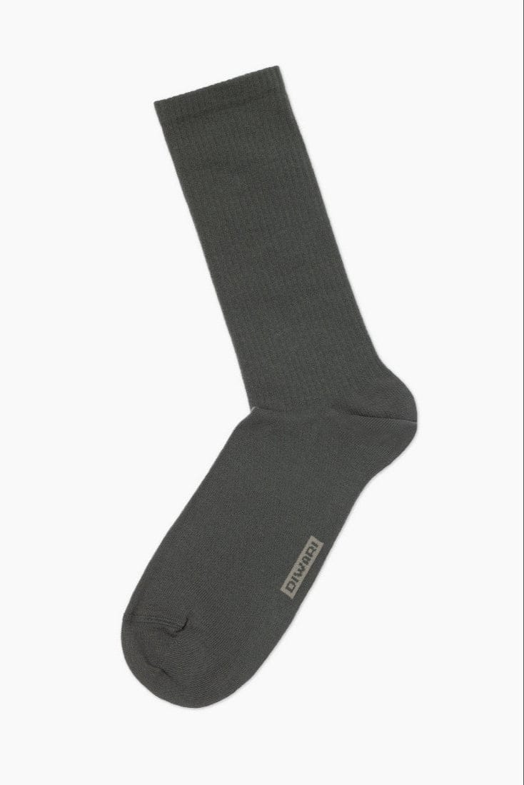 A single dark grey ribbed crew sock with a small grey brand logo on the side of the foot, isolated on a white background.