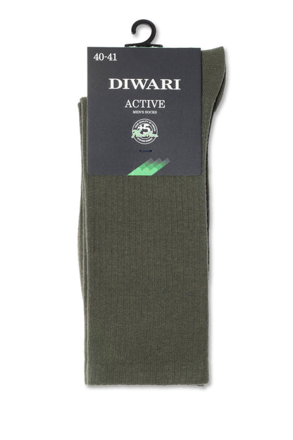 A pair of olive green crew-length socks with a dark grey cardboard label at the top featuring white text and a plastic hanging hook.