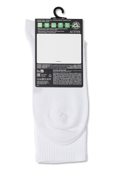 A pair of white crew socks are shown from the back, featuring a black paper hang tag at the top with product information and care instructions printed on it.