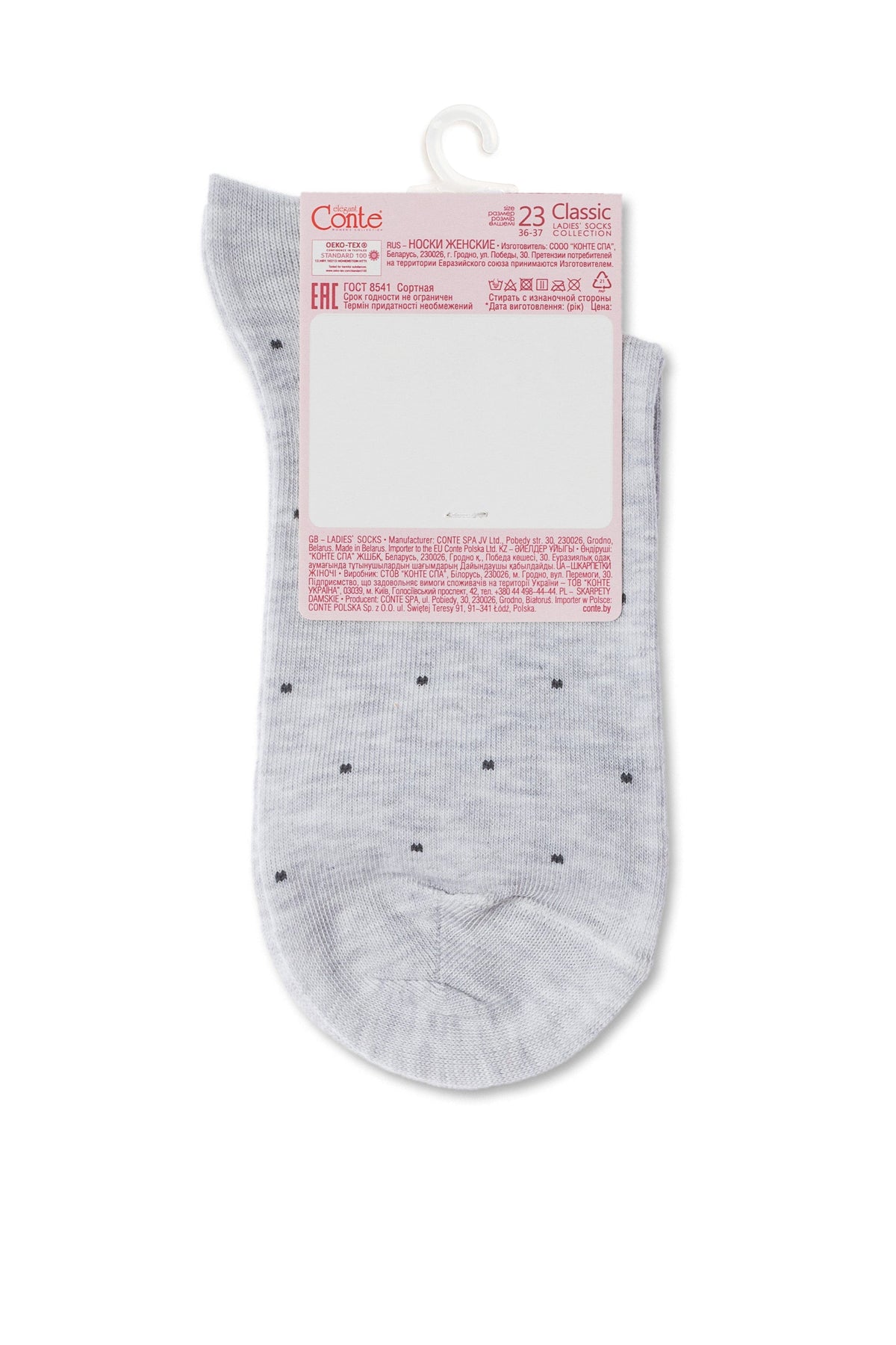 A pair of grey women's socks featuring a delicate black polka dot pattern, displayed hanging on a white plastic retail hanger.
