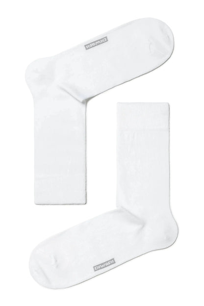 A pair of plain white crew-length socks are arranged on a white background with the word Diwari printed on the sole of each.