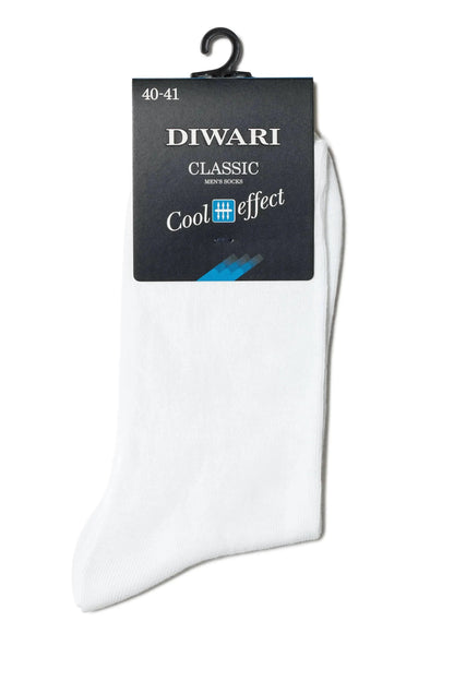 A pair of plain white mid-calf socks hangs from a black plastic hanger with a black product information tag attached at the top.