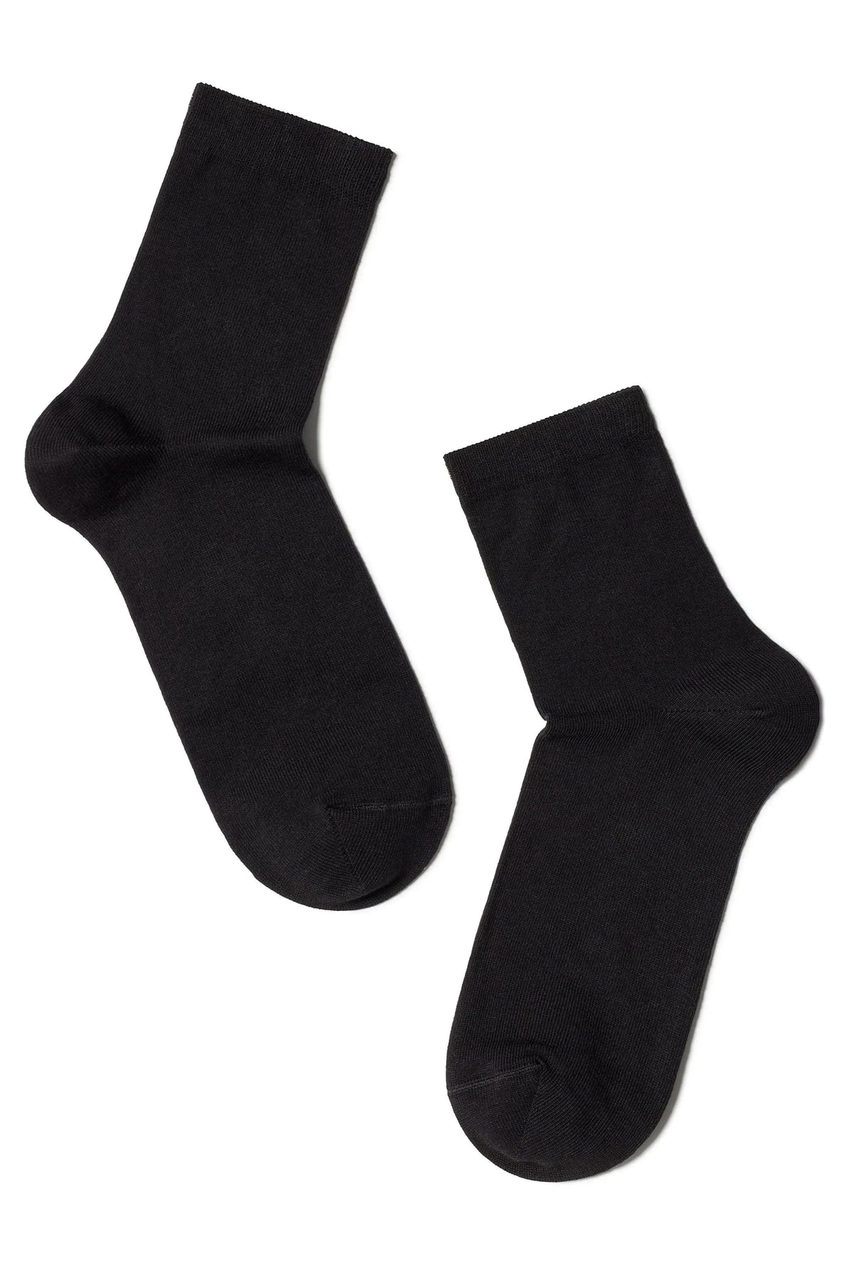 A pair of solid black crew socks shown against a plain white background.