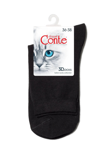 A pair of solid black ankle socks held together by a branded cardboard header card featuring an image of a fluffy white cat with bright blue eyes.