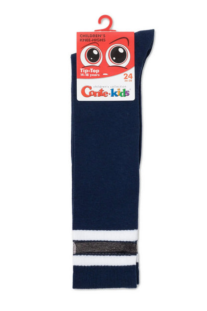 A pair of navy blue knee-high socks featuring a white and silver striped detail at the cuff and a branded product tag attached at the top.