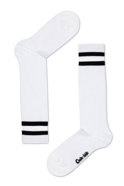 A pair of white crew-length socks featuring two horizontal black stripes at the ribbed cuffs and the text "Conte-kids" embroidered in black on the side of one foot.