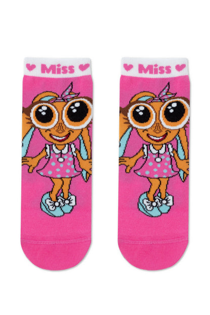 A pair of bright pink ankle socks featuring a cartoon girl character with large eyes, a polka dot dress, and a blue bow on her shoes, with the word Miss flanked by hearts on the white cuff.