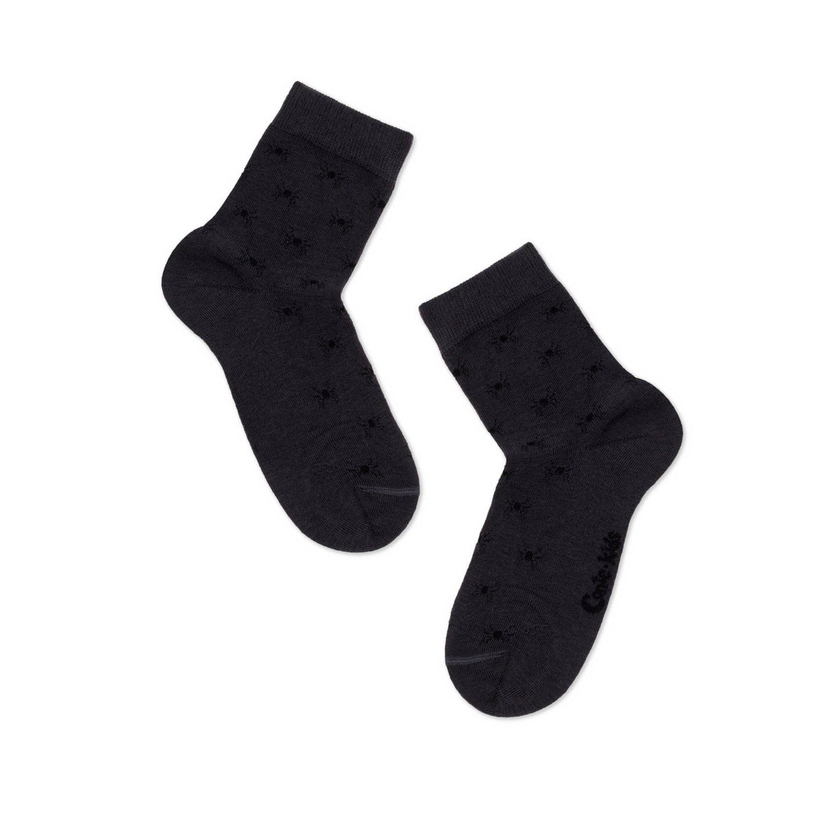 A pair of dark grey crew socks featuring a subtle, repeating pattern of small black spider icons.
