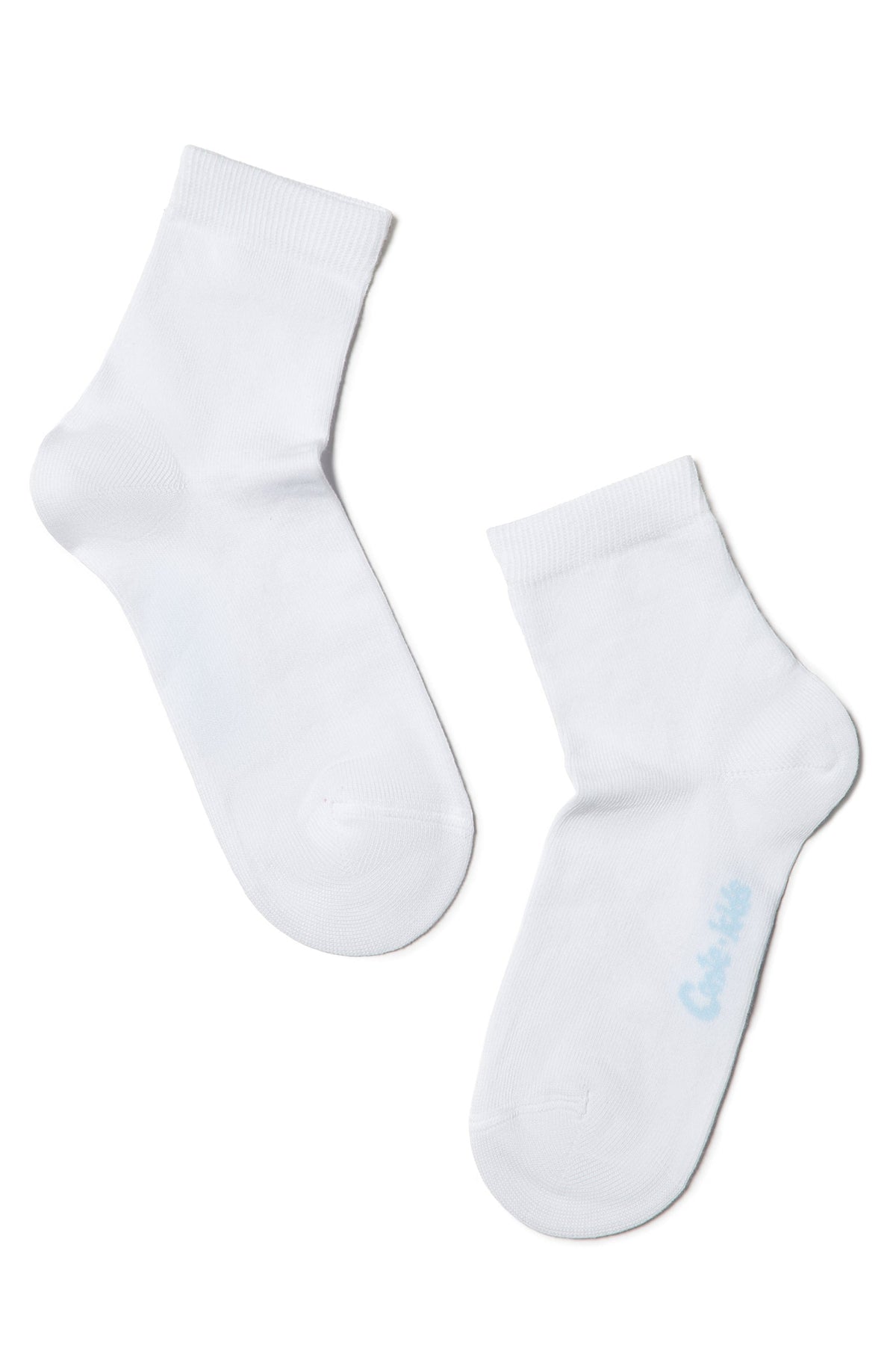 A pair of white crew-length socks featuring a subtle light blue embroidered text logo on the side of one sock against a plain white background.