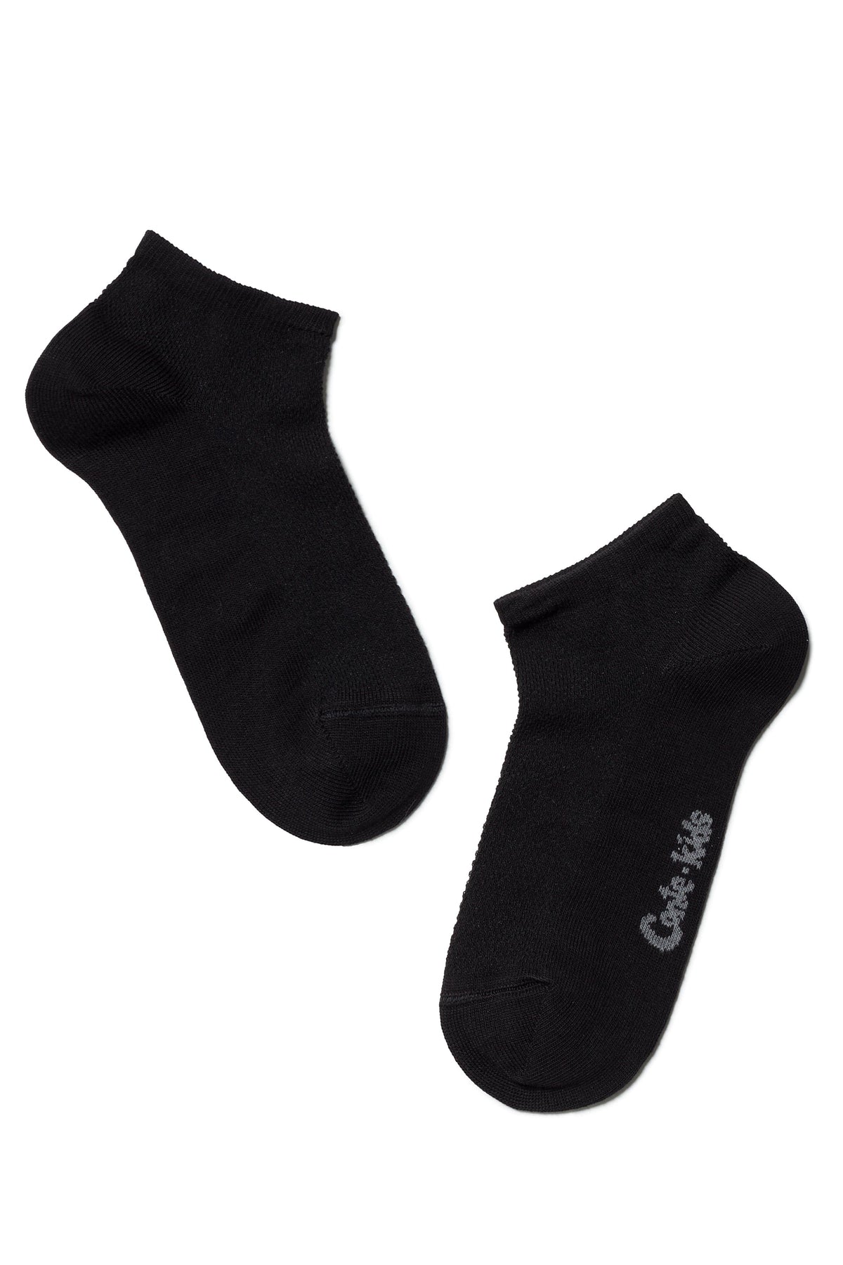 A pair of black ankle socks are shown against a white background, with a small grey brand logo printed on the side of one sock.