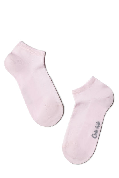 A pair of soft pink ankle socks laid flat against a white background, with a small grey brand logo printed on the side of one sock.
