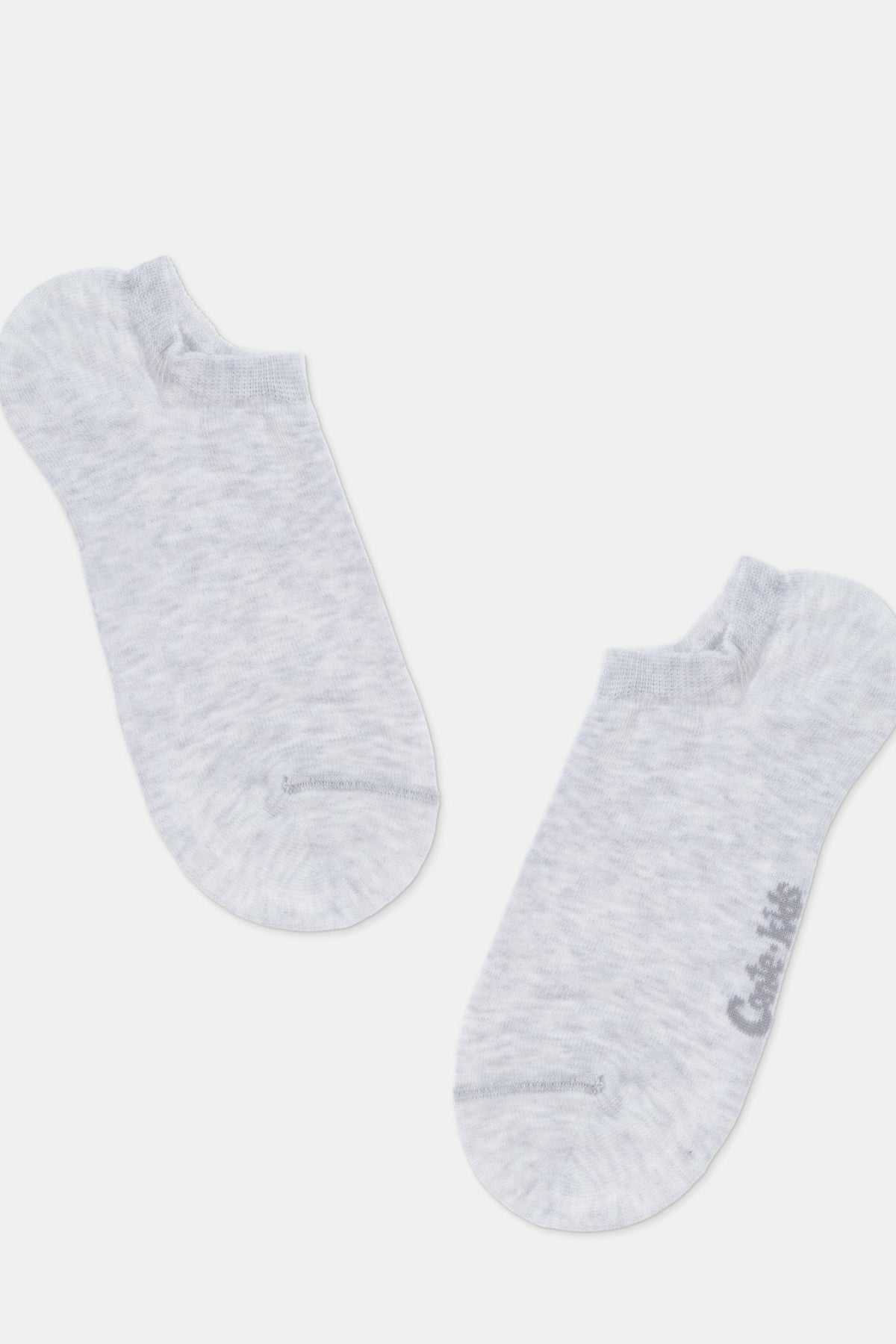 A pair of light grey, heathered ankle socks with a small grey logo on one side, displayed against a plain white background.