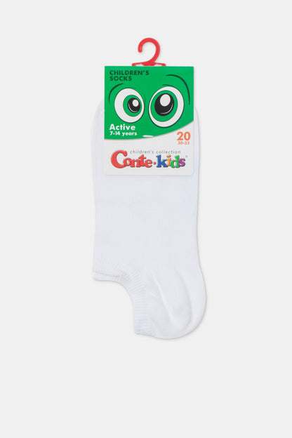 A pair of white ankle socks on a cardboard header card with a green cartoon eye graphic at the top.
